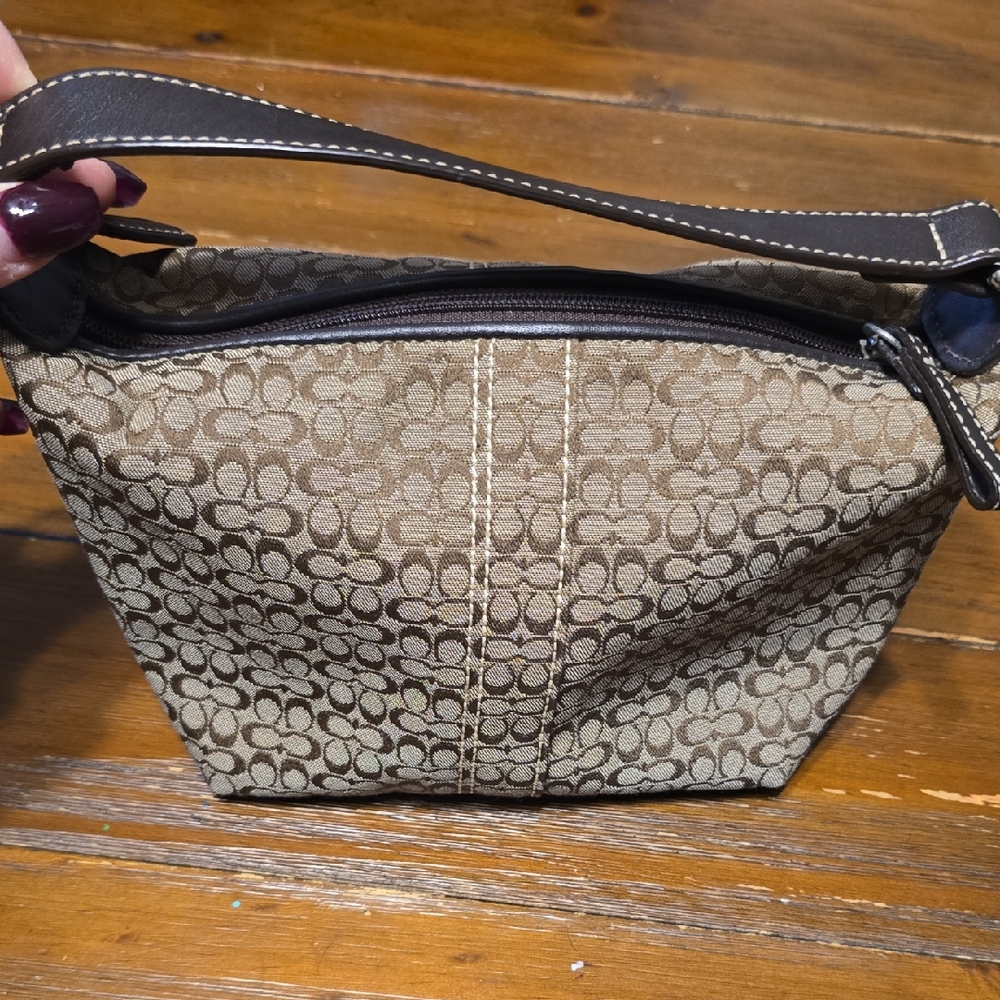 Coach Soho Mini Signature Monogram Logo bag.